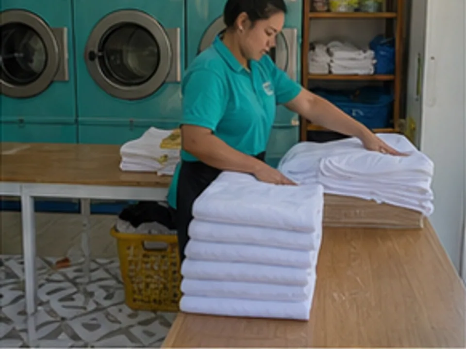 wash, dry, fold, ironing, and hotel pickup or return